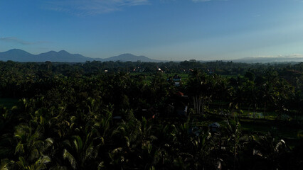 Morning Landscape of Balinese village, mountains, rice terraces