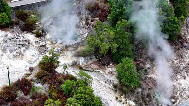 Furnas hot thermal springs, Sao Miguel Island, Azores, Portugal. Aerial 4K drone video footage of Furnas village and Caldeira do Asmodeu