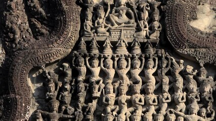 Close up view of historic rock carved statues at Angkor wat temple, Preah Khan, Amazing architecture built in 11th century.