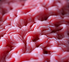 raw minced meat. close up of meat. close up of beef. ground beef background. ground beef with...
