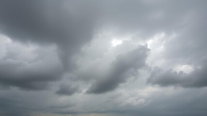 Obraz premium Panorama of fluffy white and dark gray storm clouds in rainy weather, climate, atmospheric