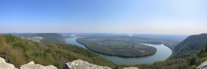 Obraz premium Scenic viewpoint overlooking the meandering river Vltava with lush greenery and rolling hills in the background, countryside, beauty