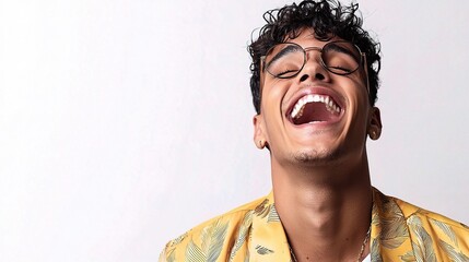 Young Brazilian Man Laughing Isolated on Bright Background, Displaying Joy and Positivity, Perfect for Lifestyle and Happiness Themes in Stock Photography