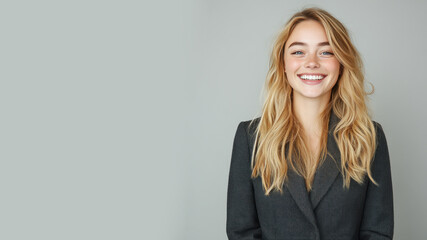 Caucasian business woman in suit blazer isolated on gray, lawyer secretary