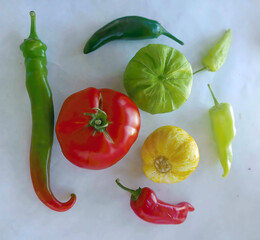 Fresh garden vegetables forming the word joy