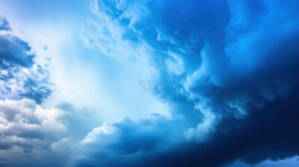 Dramatic Blue Sky with Fluffy Clouds and Darkening Storm Clouds.