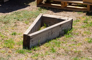 wood pieces in triangle shapes at construction site