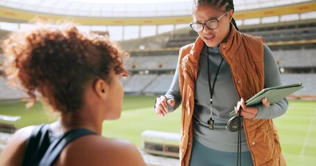 Coach, talk and women in bleachers with tablet at outdoor stadium with training advice and planning. Discussion, workout and sport with professional athlete ready for race and exercise with trainer