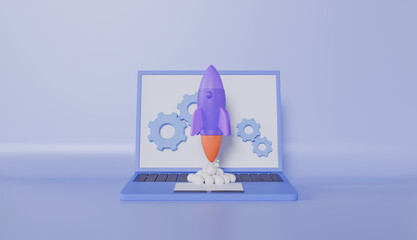 Laptop with Spaceship rocket spewing smoke Business startup future learning education concept