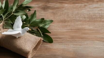 Minimalist flat lay with dove and greenery for martin luther king jr. day celebration