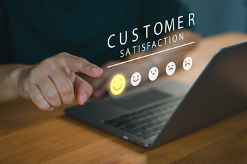 Customer select a happy face icon from a feedback scale with five emoji options, Concept of customer satisfaction, review, and positive user experience, decision-making in an online feedback system.