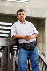 Fototapeta premium Man between 40 and 50 years old, Latino, Hispanic, Peruvian, in front of a camera in different shots