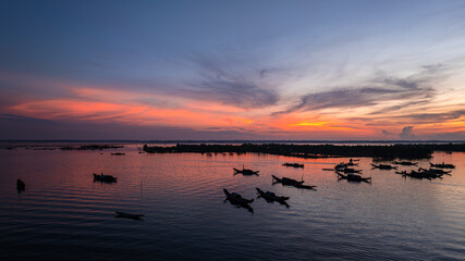 Dawn awakens and calms the fishing village in the lagoons of Hue. © huong