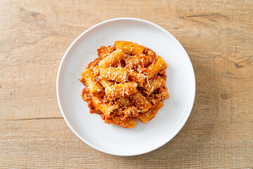 Rigatoni pasta bolognese with cheese