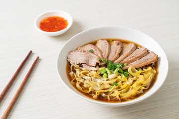 egg noodles with stewed duck in brown soup