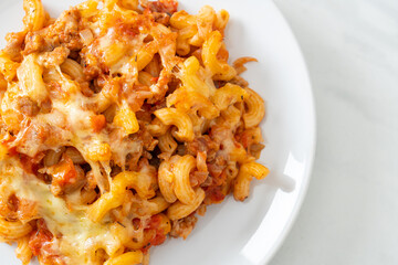 homemade macaroni bolognese with cheese