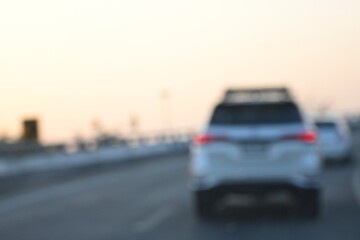 highway traffic with safety barrier on road asphalt, blurred image