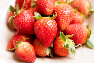 close up of strawberries on a white background