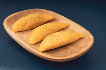 Delicious traditional Colombian empanadas with spicy sauce