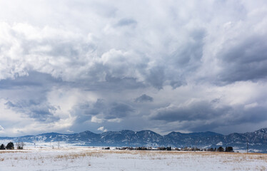 Dramatic clouds gather above the Rocky Mountains near Boulder, Colorado