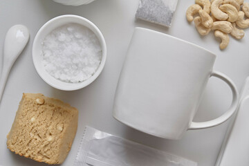 Mug with Tableware on White Background