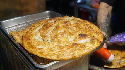 Green onion pancakes sold at stalls in Taiwan's night market