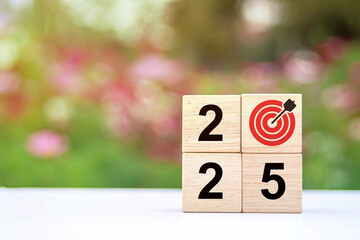 Hand assembling wooden blocks from 2024 to 2025, Happy new year 2025. 2025 goal planning....