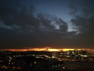 time lapse of clouds over city