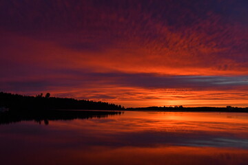 Obraz premium sunset over the river