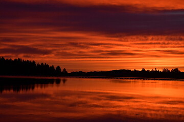 Fototapeta premium sunset over lake