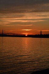 Obraz premium sunset over the river