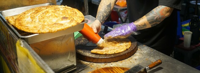 Green onion pancakes sold at stalls in Taiwan's night market