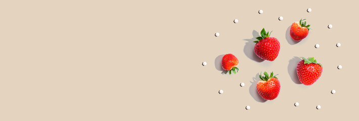 Fresh red strawberries overhead view - flat lay