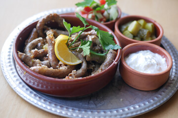 Traditional dolma grape leaves on a plate 