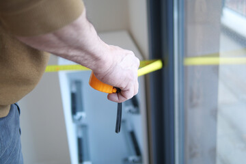 Accurately Measuring Window Dimensions Using a Tape Measure for Various Projects