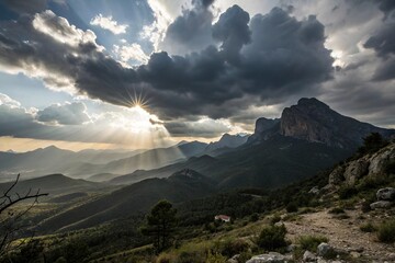 A majestic sun is hidden behind thick grey clouds, casting a dramatic shadow over a rugged mountain range, rocky, shadow, silhouette, scenic