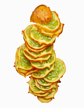 Sliced Horned Melon in Layered Composition on White Background