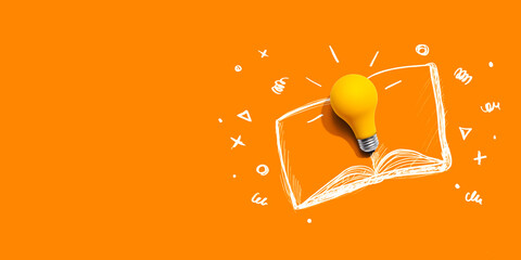 An open book with a lightbulb - flat lay