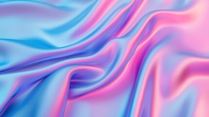 Obraz premium A close-up of soft, flowing fabric with a gradient of vibrant pink and blue colors, showcasing smooth textures and gentle folds.