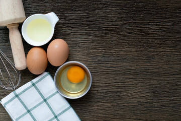 Food ingredients , kitchen utensils for cooking on wooden background