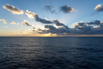 Stunning sunset over the ocean viewed from a cruise ship in the Atlantic