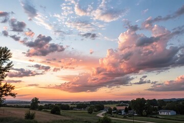 Fototapeta premium Soft pastel clouds drift lazily across the sky at sunset, tranquil mood, gentle hues, beautiful sunset