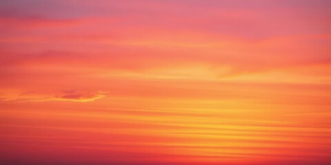 Obraz premium Vibrant and colorful gradient of a beautiful sunset with shades of orange, pink, and purple, tranquil, background