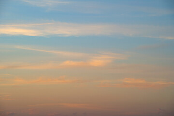 summer evening, sunset in yellow, orange and pink with clouds, background