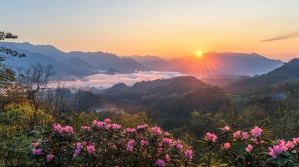 A vibrant sunrise over Mount Cangshan, Yunnan, China, with clear skies, mist rolling over valleys, and the mountains glowing in warm, golden hues as the sun rises behind them