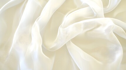 Obraz premium A soft, flowing white fabric drapes elegantly, showcasing its delicate texture and lightness.