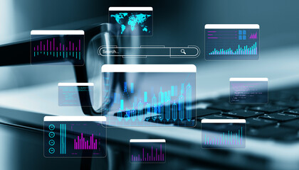 Digital data analysis interface with charts and graphs floating over a laptop in a modern business environment.