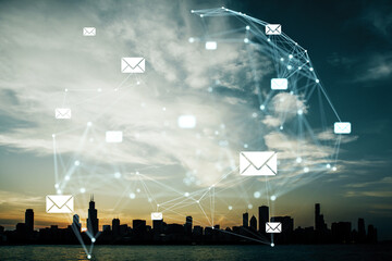 Digital email network with envelopes connecting over urban skyline at sunset.