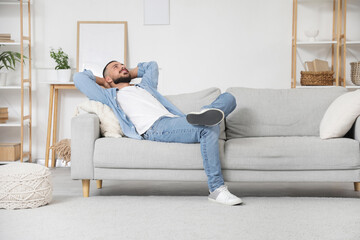 Young man resting on his day off at home