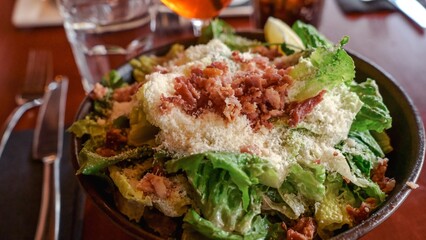 Delicious Fresh Green Salad with Crispy Bacon, Cheese, and Zesty Lemon Dressing